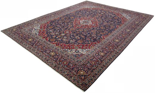 Corner detail of 2000s Kashan rug showing border pattern and Wool pile