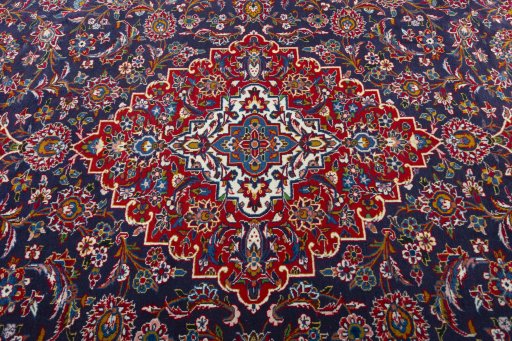 Central medallion detail of 2000s Kashan rug from Iran / Persia