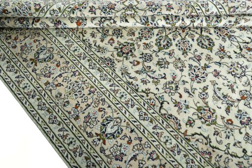 Close-up detail of 2000s Kashan rug from Iran / Persia showing Wool weave