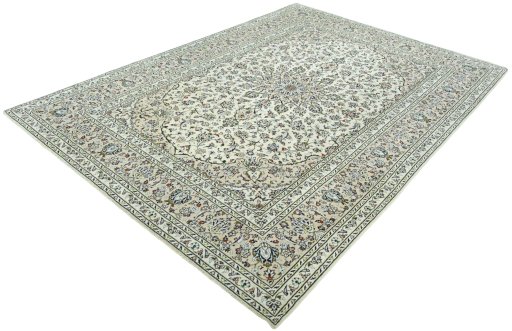 Corner detail of 2000s Kashan rug showing border pattern and Wool pile