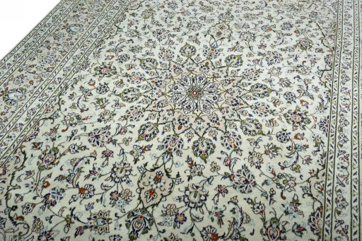 Backside of handmade 2000s Kashan rug showing knot structure and weave density