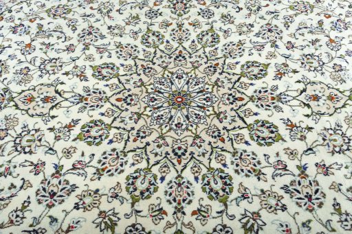 Central medallion detail of 2000s Kashan rug from Iran / Persia