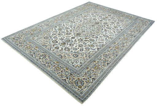 Corner detail of 2000s Kashan rug showing border pattern and Wool pile
