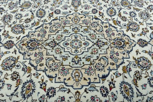 Central medallion detail of 2000s Kashan rug from Iran / Persia
