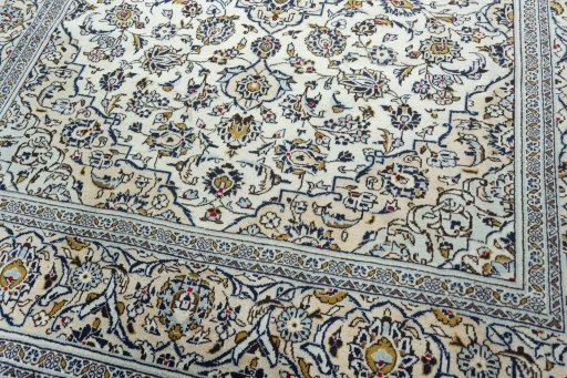Close-up detail of 2000s Kashan rug from Iran / Persia showing Wool weave