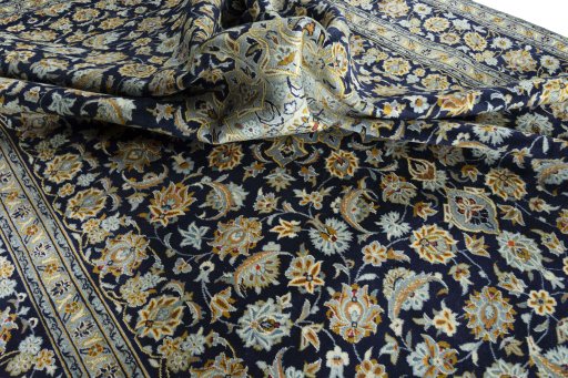 Surface texture of 1970s Kashan rug with natural Wool and intricate pattern