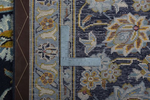 Close-up detail of 1970s Kashan rug from Iran / Persia showing Wool weave