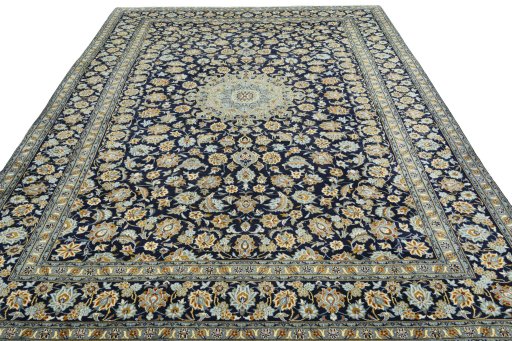 Surface texture of 1970s Kashan rug with natural Wool and intricate pattern