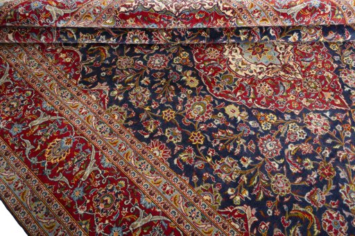 Close-up detail of 2000s Kashan rug from Iran / Persia showing Cork weave