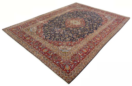 Corner detail of 2000s Kashan rug showing border pattern and Cork pile