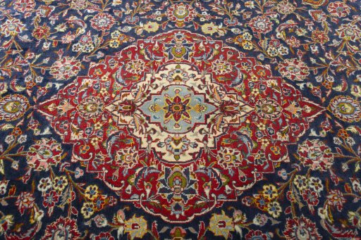 Central medallion detail of 2000s Kashan rug from Iran / Persia