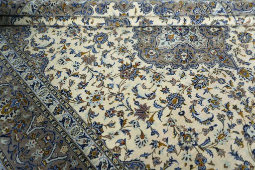 Close-up detail of 2000s Kashan rug from Iran / Persia showing Wool weave