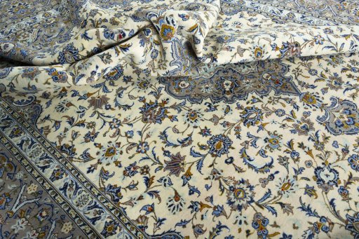 Surface texture of 2000s Kashan rug with natural Wool and intricate pattern