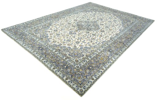 Corner detail of 2000s Kashan rug showing border pattern and Wool pile