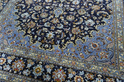 Close-up detail of 2000s Kashan rug from Iran / Persia showing Wool weave