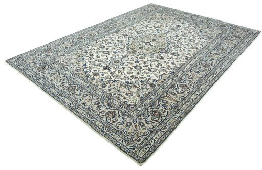 Corner detail of 2000s Kashan rug showing border pattern and Wool pile