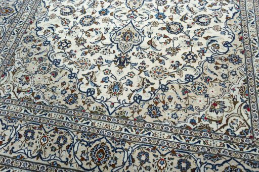 Close-up detail of 2000s Kashan rug from Iran / Persia showing Wool weave