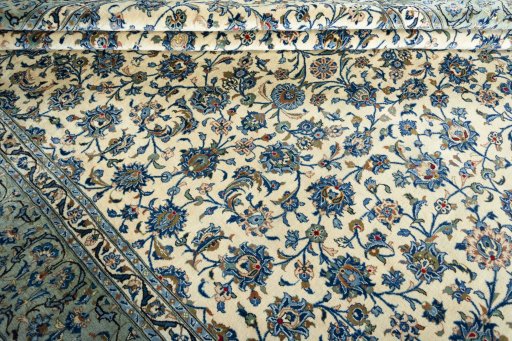 Close-up detail of 2000s Kashan rug from Iran / Persia showing Wool weave