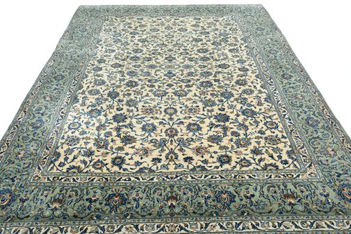 Surface texture of 2000s Kashan rug with natural Wool and intricate pattern