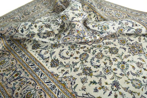 Surface texture of 2000s Kashan rug with natural Wool and intricate pattern