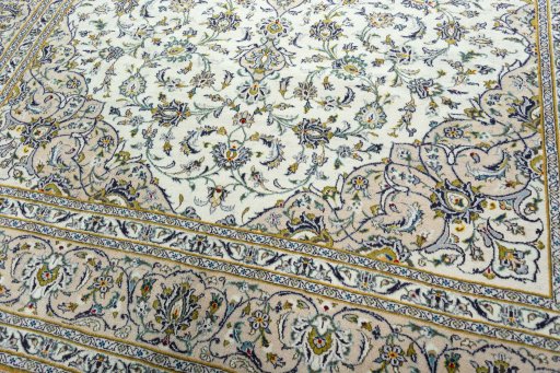 Close-up detail of 2000s Kashan rug from Iran / Persia showing Wool weave