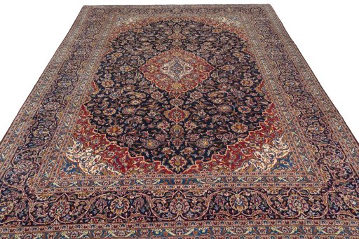 Surface texture of 2000s Kashan rug with natural Wool and intricate pattern
