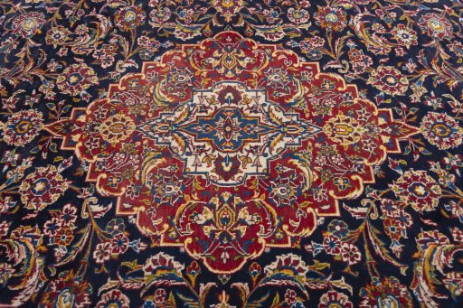 Central medallion detail of 2000s Kashan rug from Iran / Persia