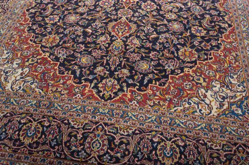 Close-up detail of 2000s Kashan rug from Iran / Persia showing Wool weave