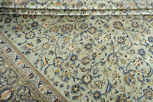 Close-up detail of 2000s Kashan rug from Iran / Persia showing Wool weave