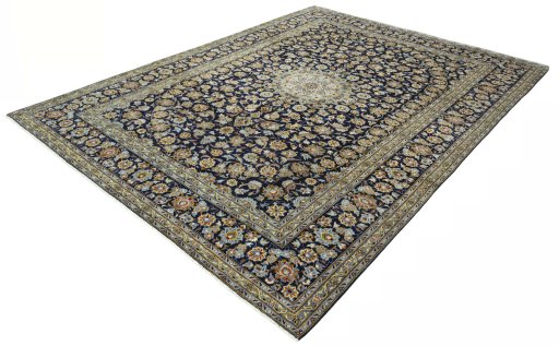 Corner detail of 2000s Kashan rug showing border pattern and Wool pile