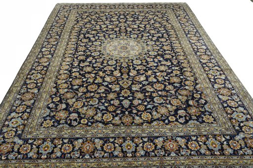 Surface texture of 2000s Kashan rug with natural Wool and intricate pattern