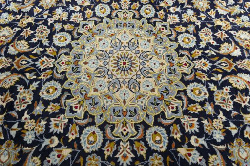 Central medallion detail of 2000s Kashan rug from Iran / Persia