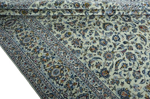 Close-up detail of 2000s Kashan rug from Iran / Persia showing Wool weave