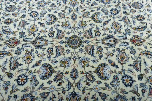 Central medallion detail of 2000s Kashan rug from Iran / Persia