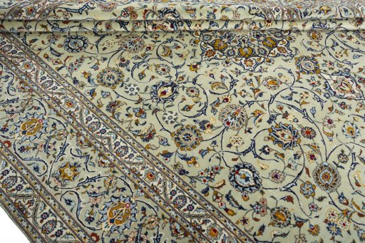Close-up detail of 2000s Kashan rug from Iran / Persia showing Wool weave