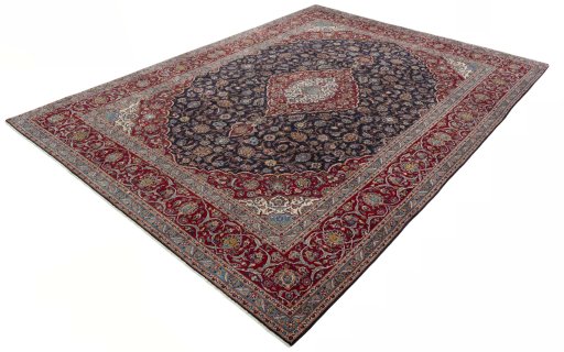 Corner detail of 2000s Kashan rug showing border pattern and Wool pile