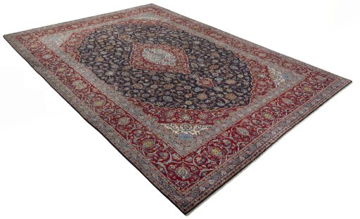 Close-up detail of 2000s Kashan rug from Iran / Persia showing Wool weave