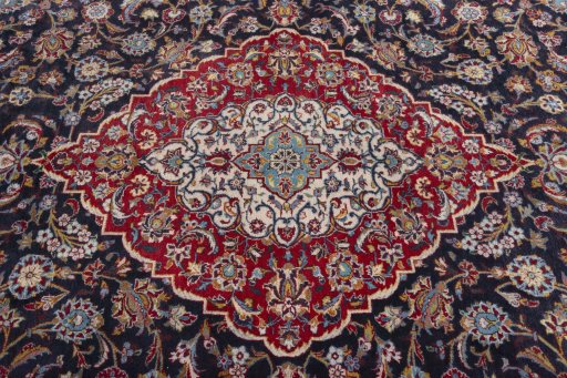 Central medallion detail of 2000s Kashan rug from Iran / Persia