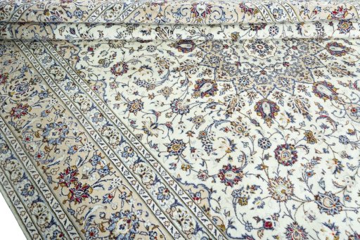 Close-up detail of 2000s Kashan rug from Iran / Persia showing Wool weave