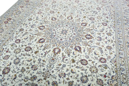 Backside of handmade 2000s Kashan rug showing knot structure and weave density