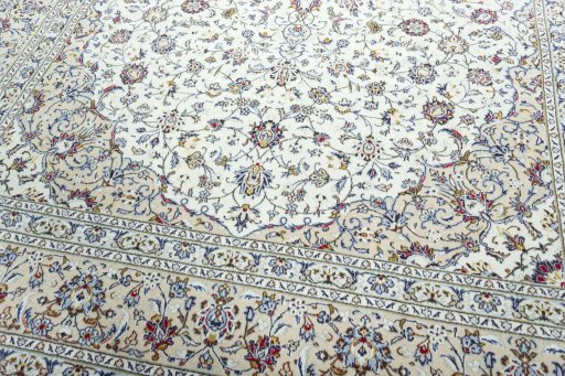 Close-up detail of 2000s Kashan rug from Iran / Persia showing Wool weave