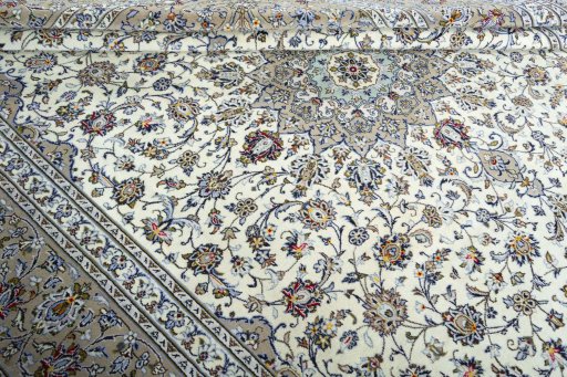 Close-up detail of 2000s Kashan rug from Iran / Persia showing Wool weave