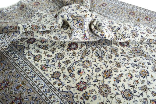Surface texture of 2000s Kashan rug with natural Wool and intricate pattern