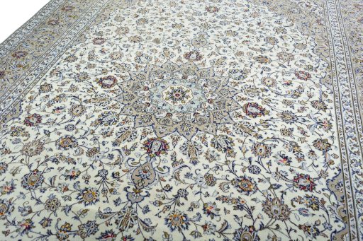 Backside of handmade 2000s Kashan rug showing knot structure and weave density