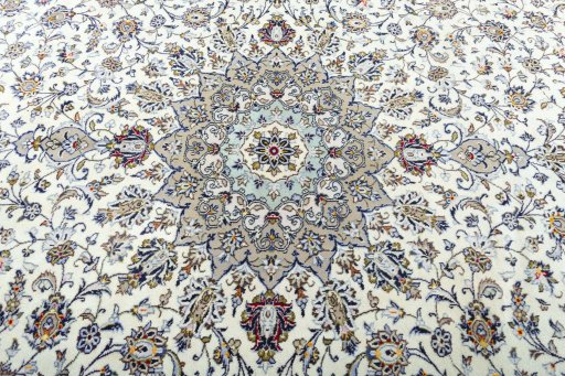 Central medallion detail of 2000s Kashan rug from Iran / Persia