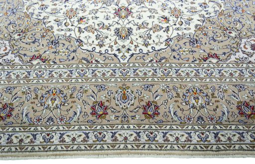 Full view of 2000s Kashan rug from Iran / Persia, 408 × 303 cm in Beige tones