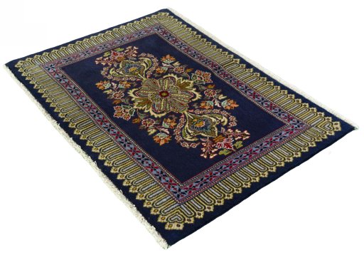 Corner detail of New Kashan rug showing border pattern and Cork pile