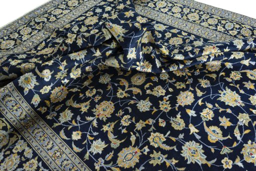 Surface texture of 1970s Kashan rug with natural Wool and intricate pattern
