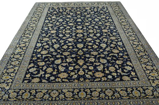 Surface texture of 1970s Kashan rug with natural Wool and intricate pattern