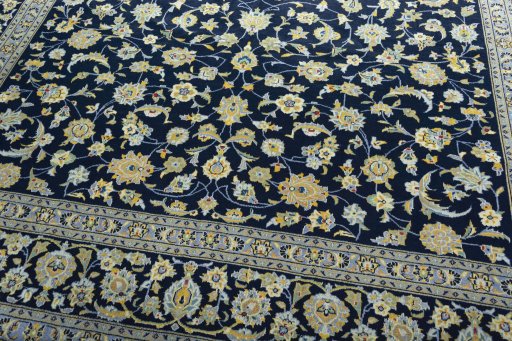 Close-up detail of 1970s Kashan rug from Iran / Persia showing Wool weave